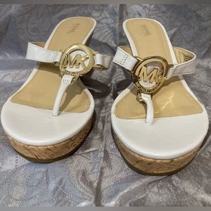 Michael Kors classy cream cork wedge sandals with Gold MK emblem